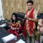 Radhe Maa sits in SHOâs chair at Delhi police station as he stands with folded hands